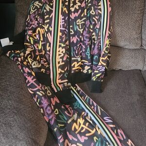 LIKE NEW ADIDAS LOVE UNITES TRACK SUIT AND MATCHING SHORTS* READ DESCRIPTION*